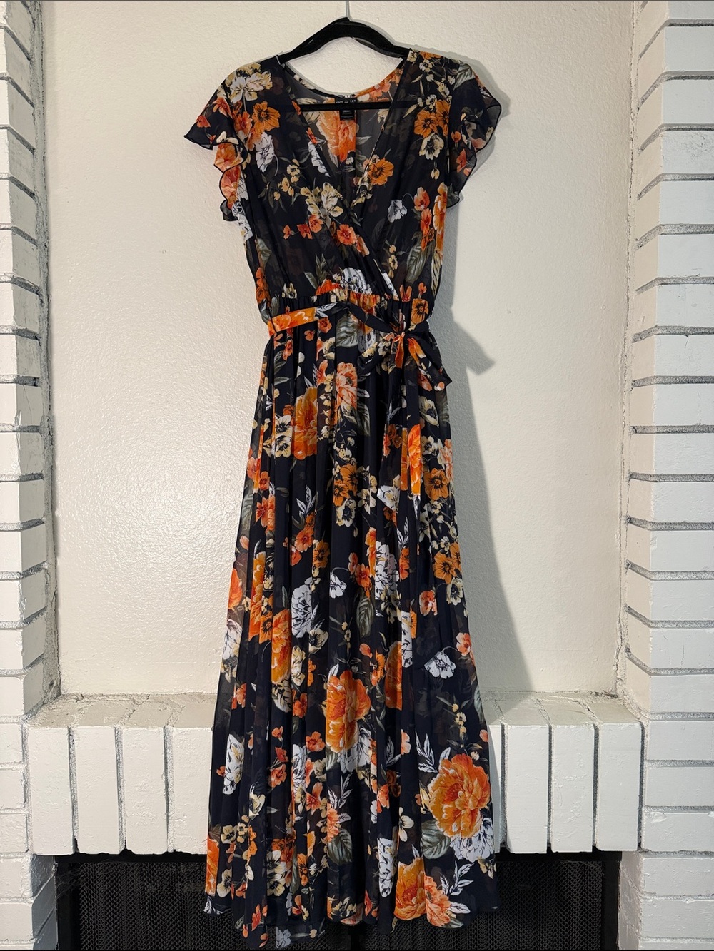 Black Floral Faux-Wrap Maxi Dress with Orange Bloom
